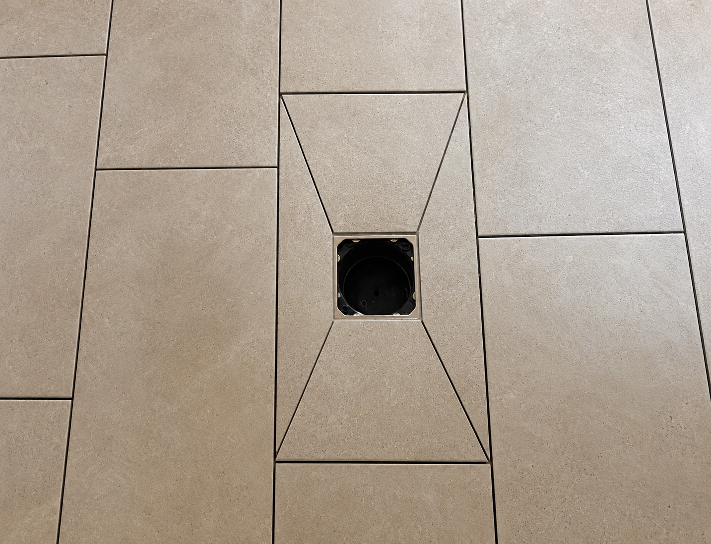 Beige Shower Tilework with Square Drain