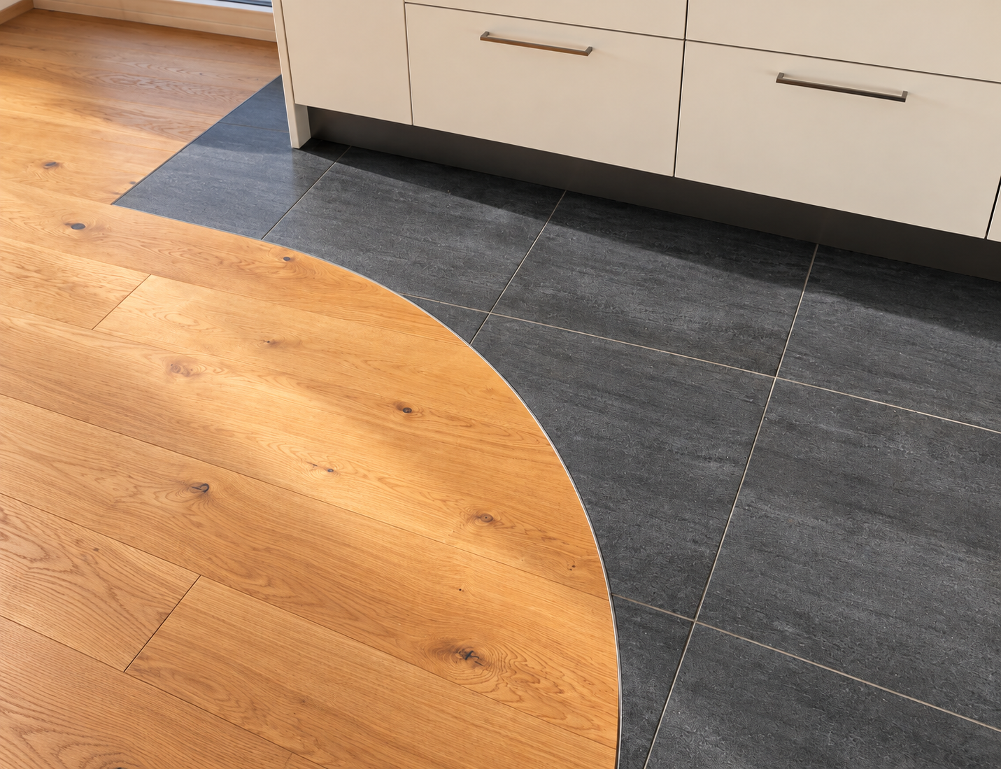 Curved wood-to-stone floor transition