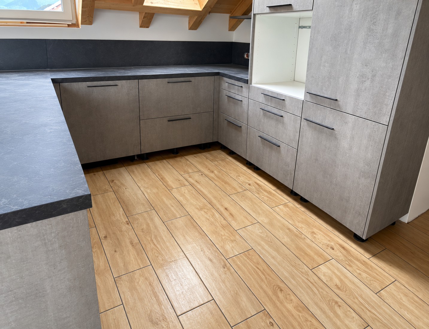 Honey wood-look tile attic kitchen