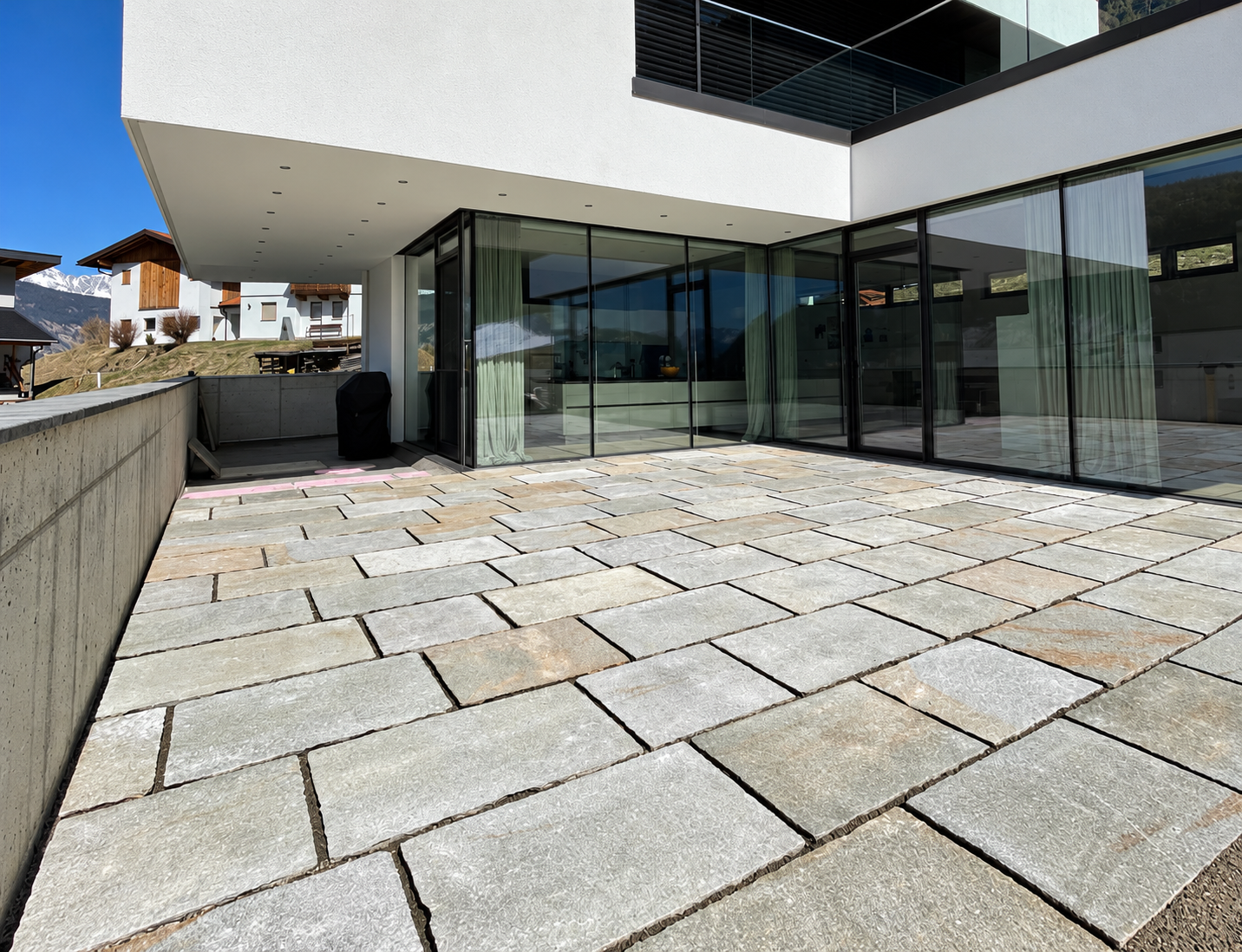 Sunlit natural-stone terrace