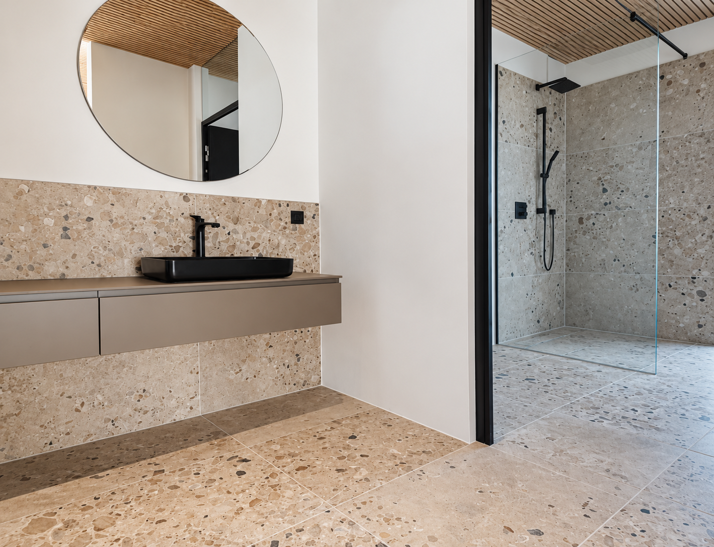 Terrazzo bathroom with black fixtures