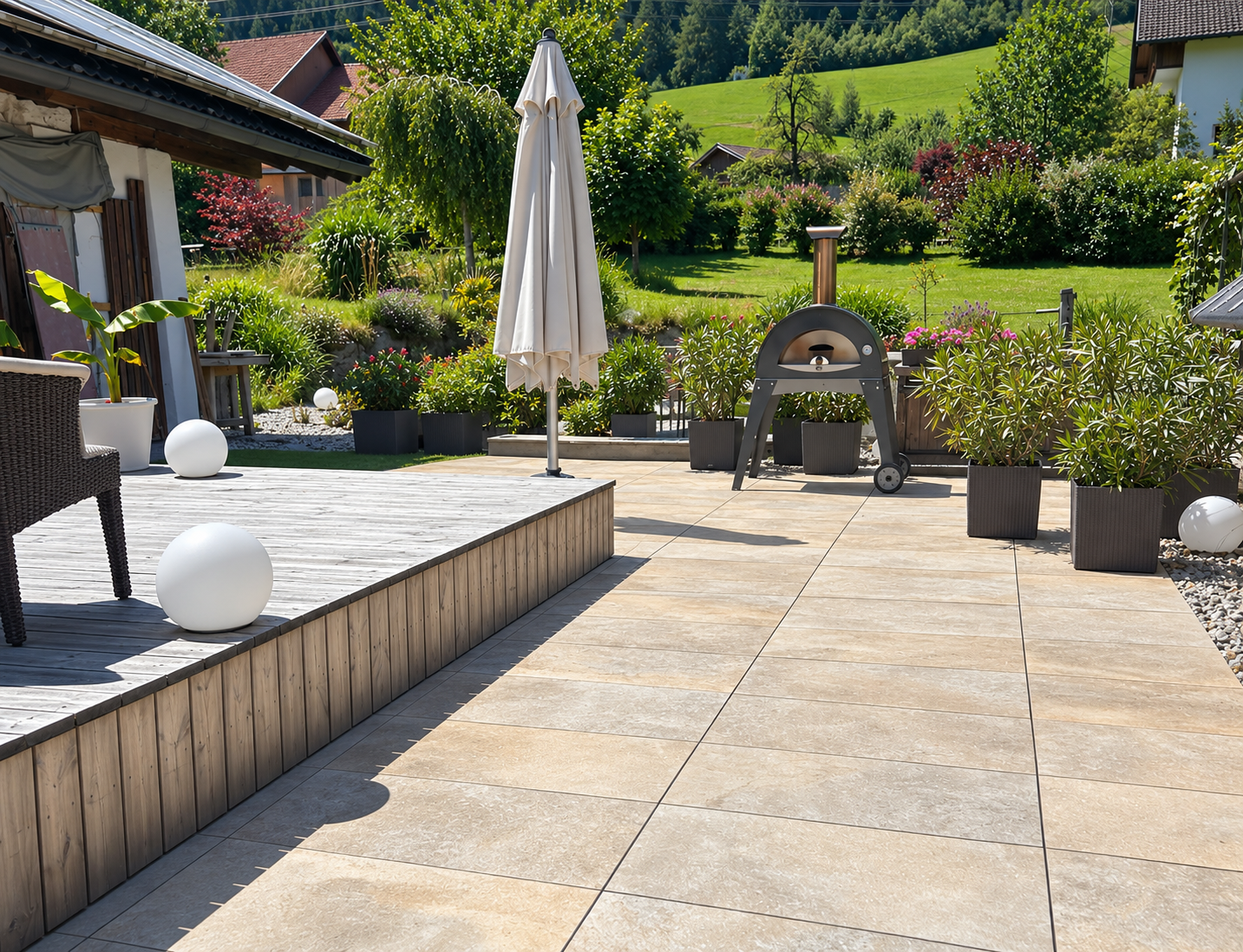 Tidy sunlit terrace with white parasol