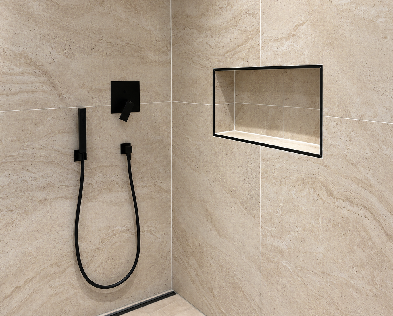 Tiled shower niche with black trim